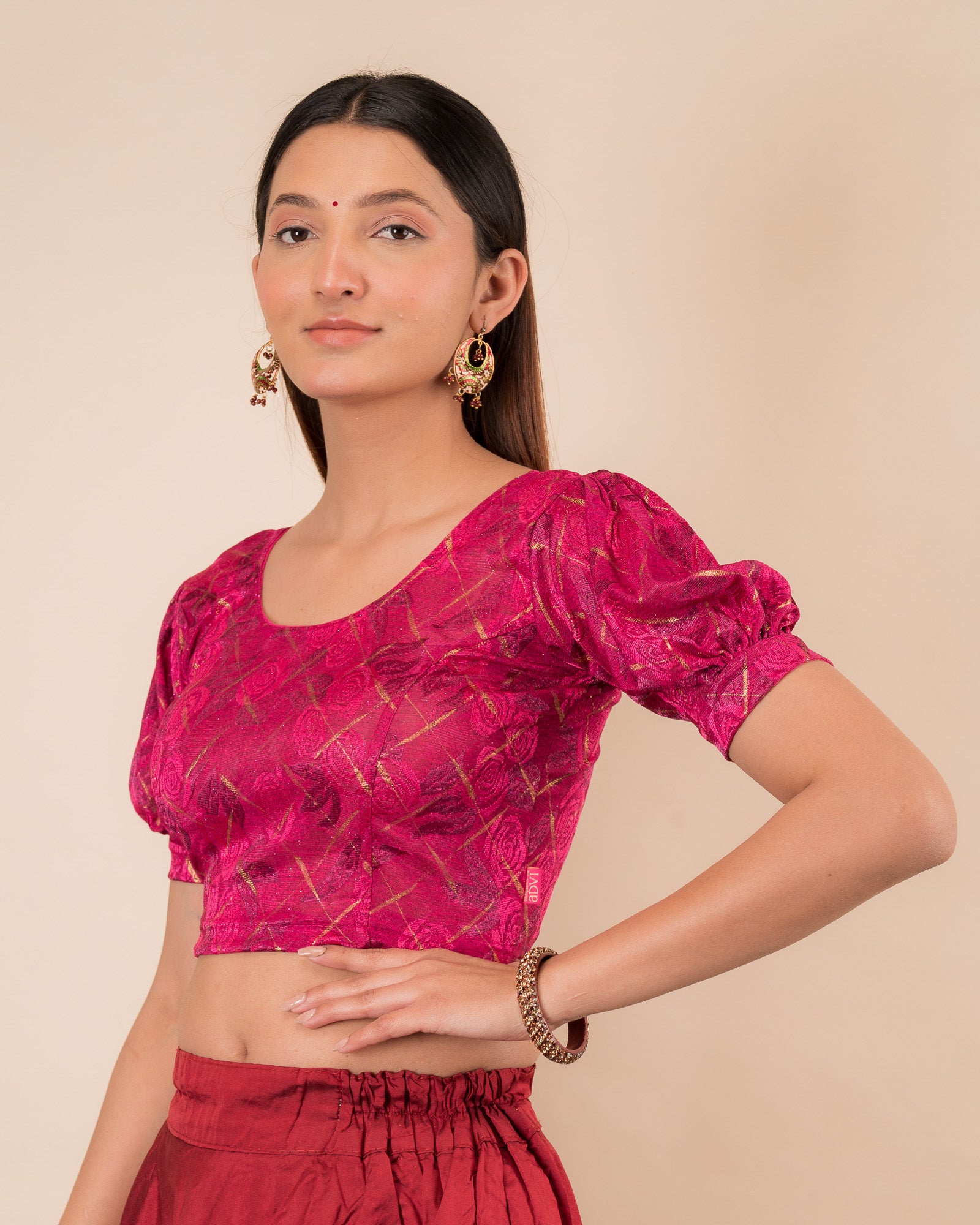 Side profile of the grey melange stretchable blouse highlighting the fit and sleeve length