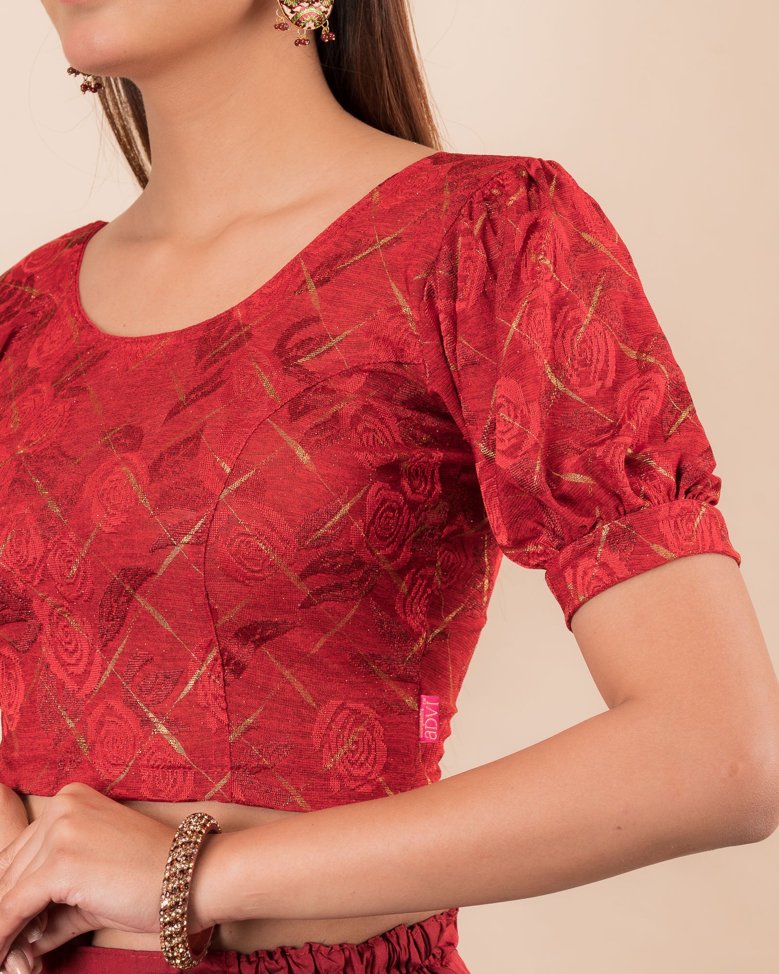 Close-up of the melange jacquard fabric detailing the texture and subtle gold glitter of the readymade blouse