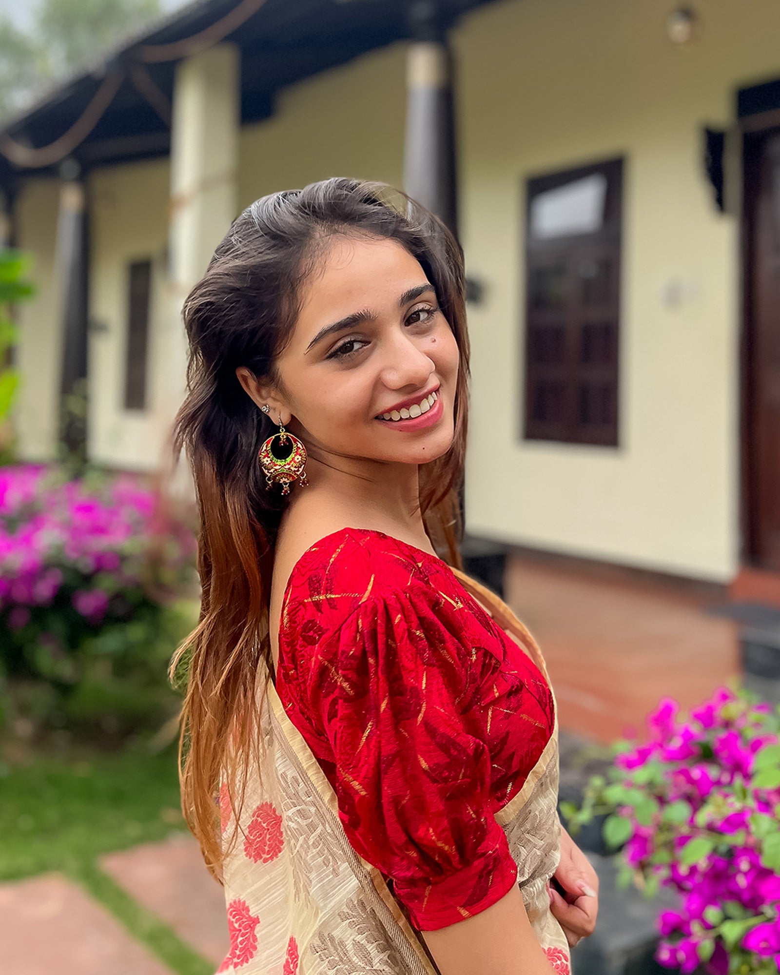 Model pairing the grey melange stretchable blouse with a traditional saree, demonstrating a complete ethnic look