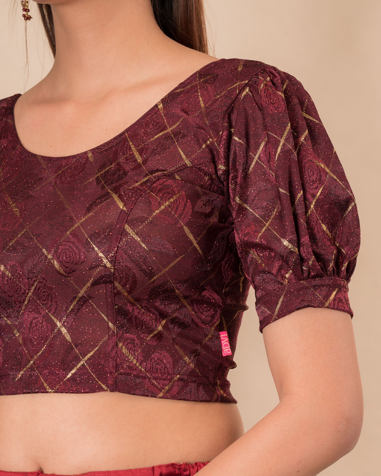 Model pairing the grey melange stretchable blouse with a traditional saree, demonstrating a complete ethnic look