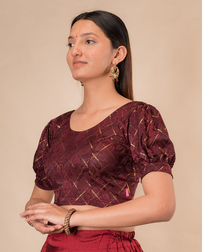  Side profile of the grey melange stretchable blouse highlighting the fit and sleeve length