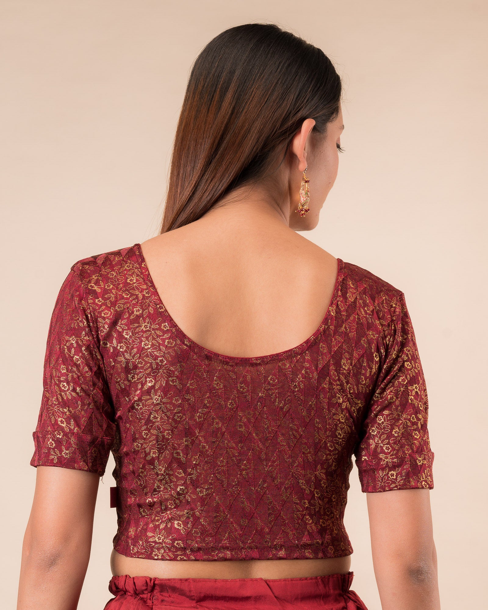 Rear view showcasing the back design of the slip-on blouse