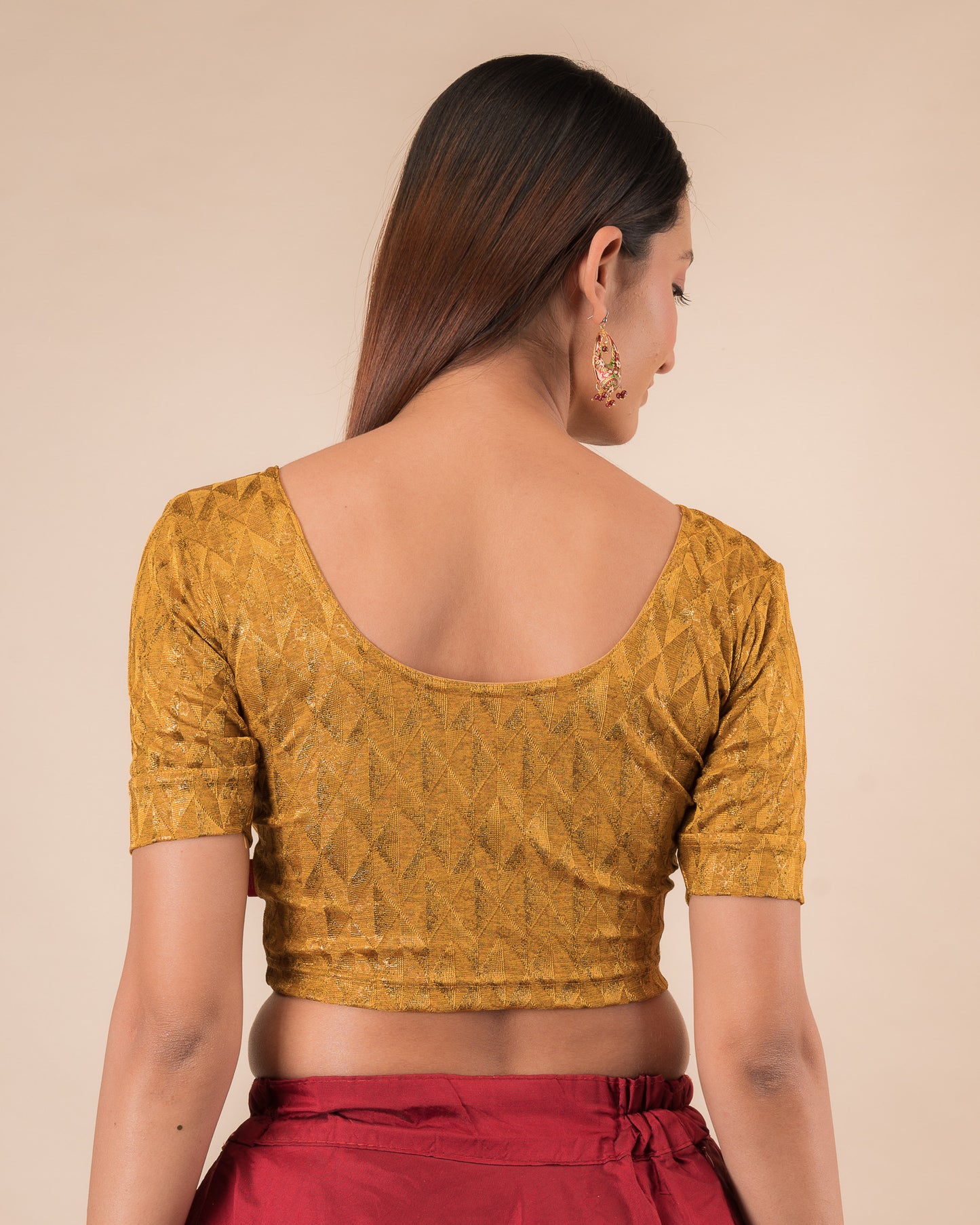 Rear view showcasing the back design of the slip-on blouse