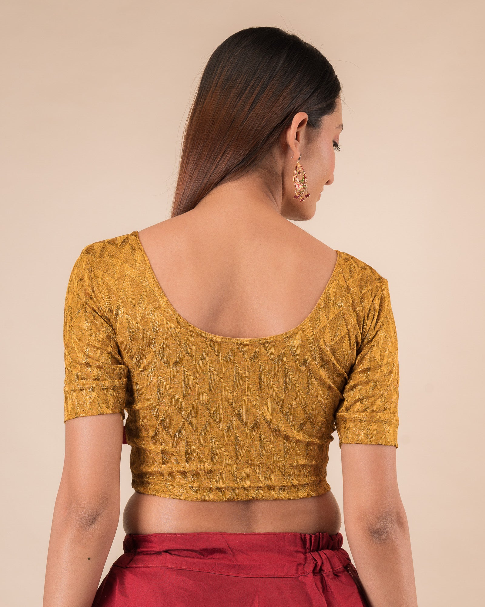 Rear view showcasing the back design of the slip-on blouse