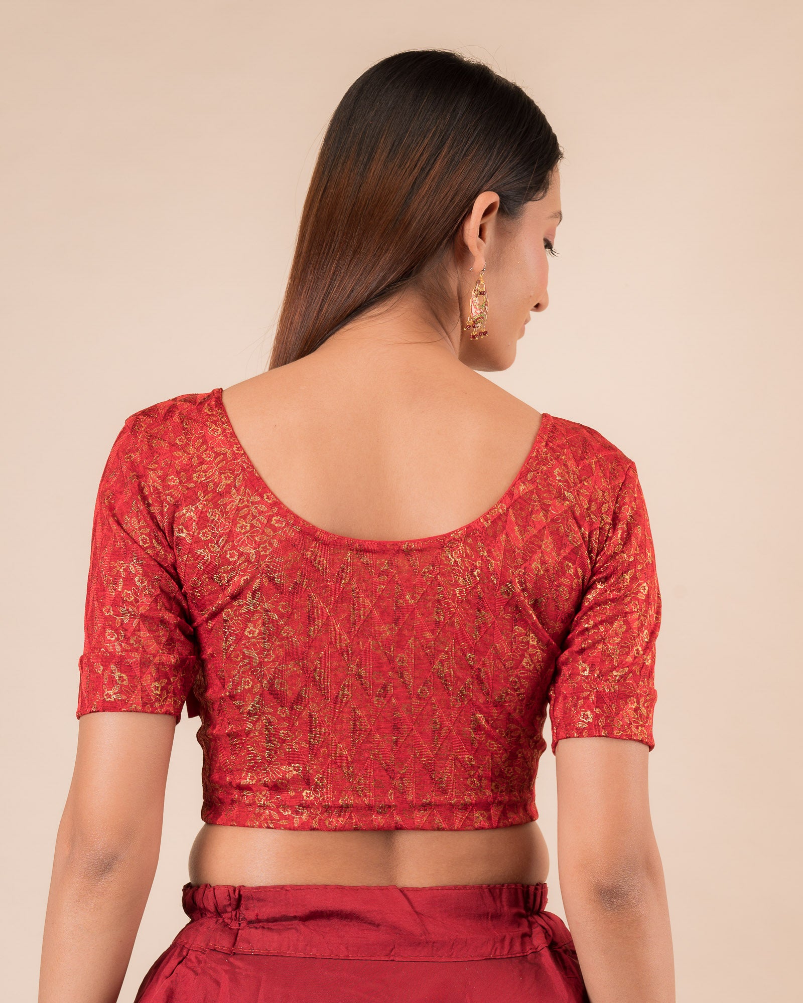 Rear view showcasing the back design of the slip-on blouse