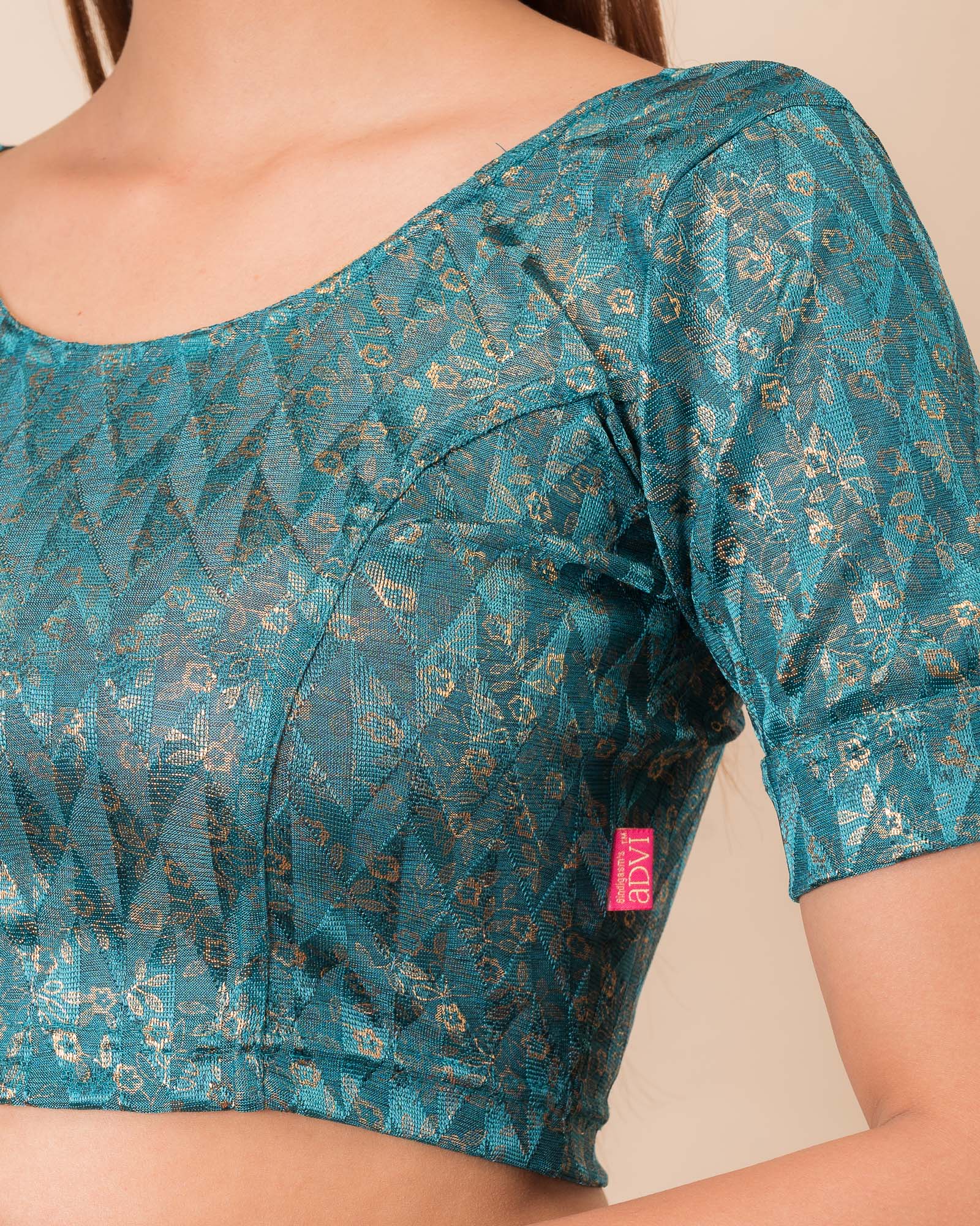 Close-up of the melange jacquard fabric with metallic foil and texture