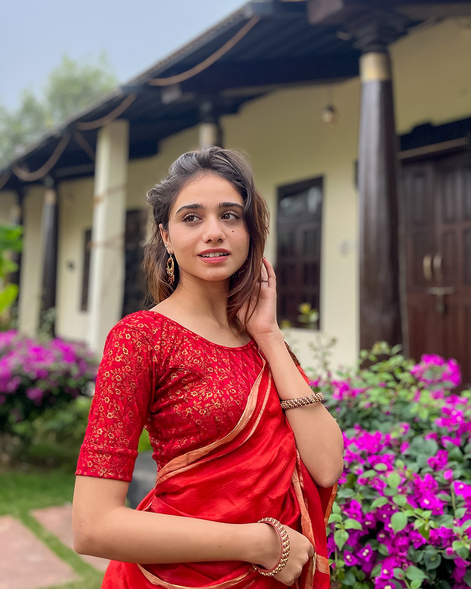 Model pairing the blouse with a saree for festive look