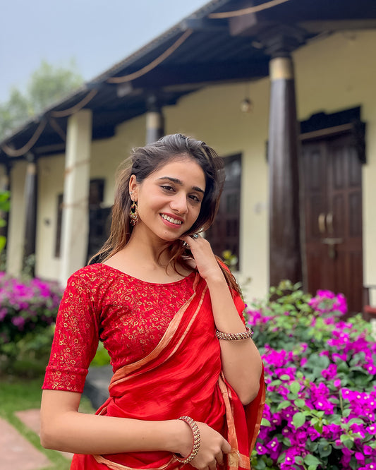 Model pairing the blouse with a saree for festive look