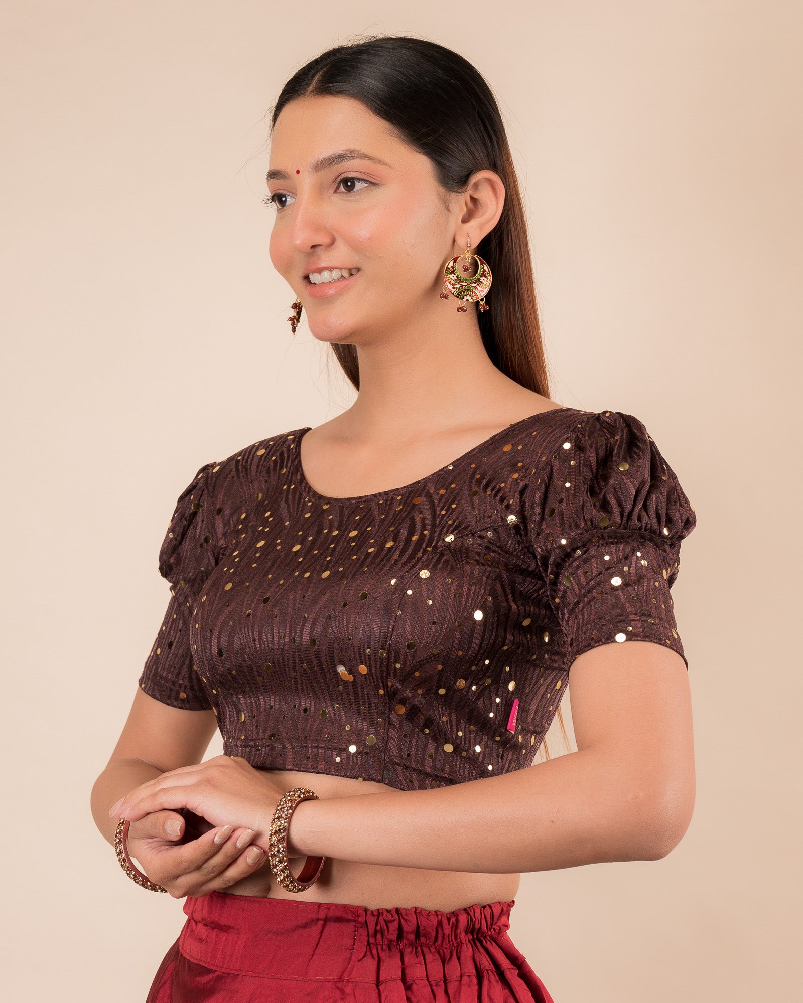 Side profile highlighting the fit and puffed sleeve silhouette