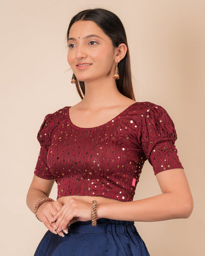 Side profile highlighting the fit and puffed sleeve silhouette