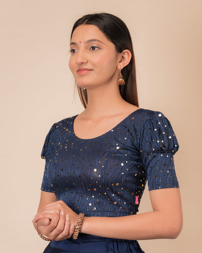 Side profile highlighting the fit and puffed sleeve silhouette