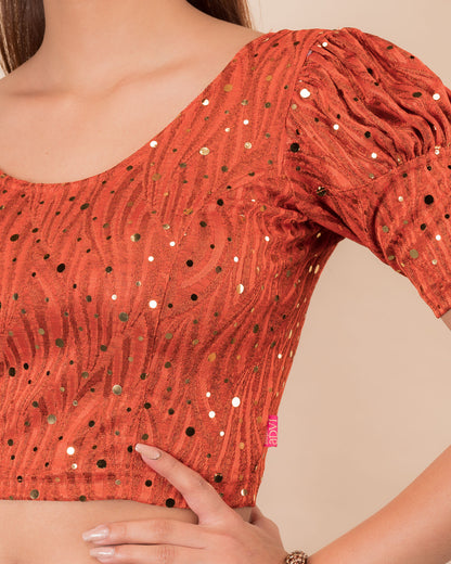 Close-up showing mirror embellishments on the jacquard stretchable fabric