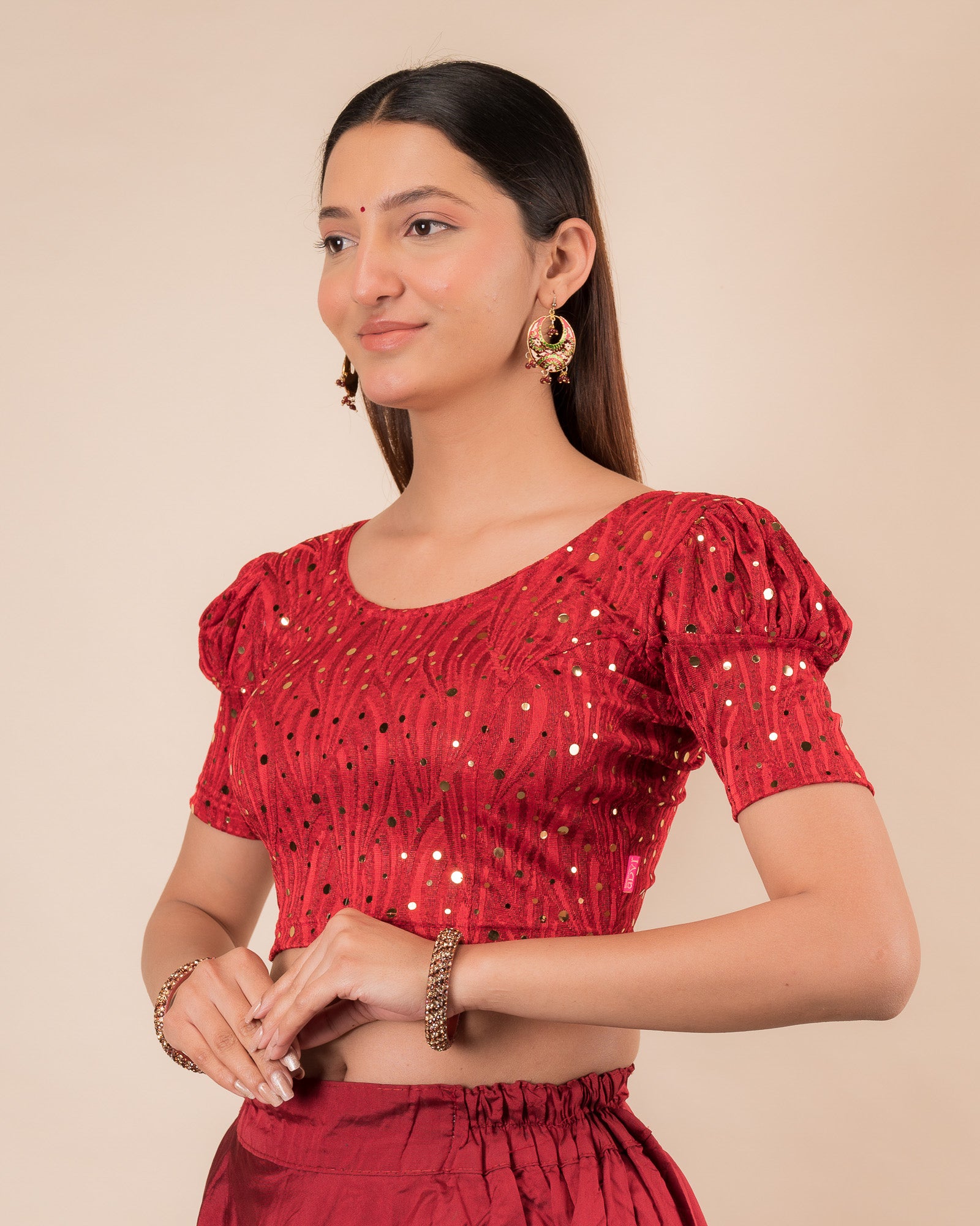  Side profile highlighting the fit and puffed sleeve silhouette.