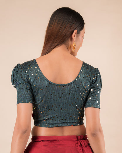 Rear view showing the round back design and mirror work