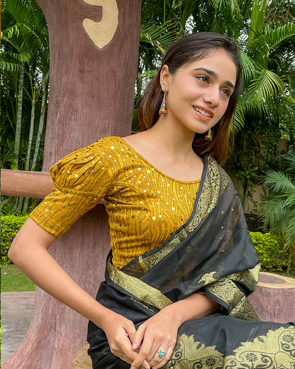 Model pairing the blouse with a saree for a festive occasion