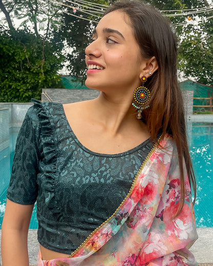 Model pairing the blouse with a saree or skirt for a festive look.