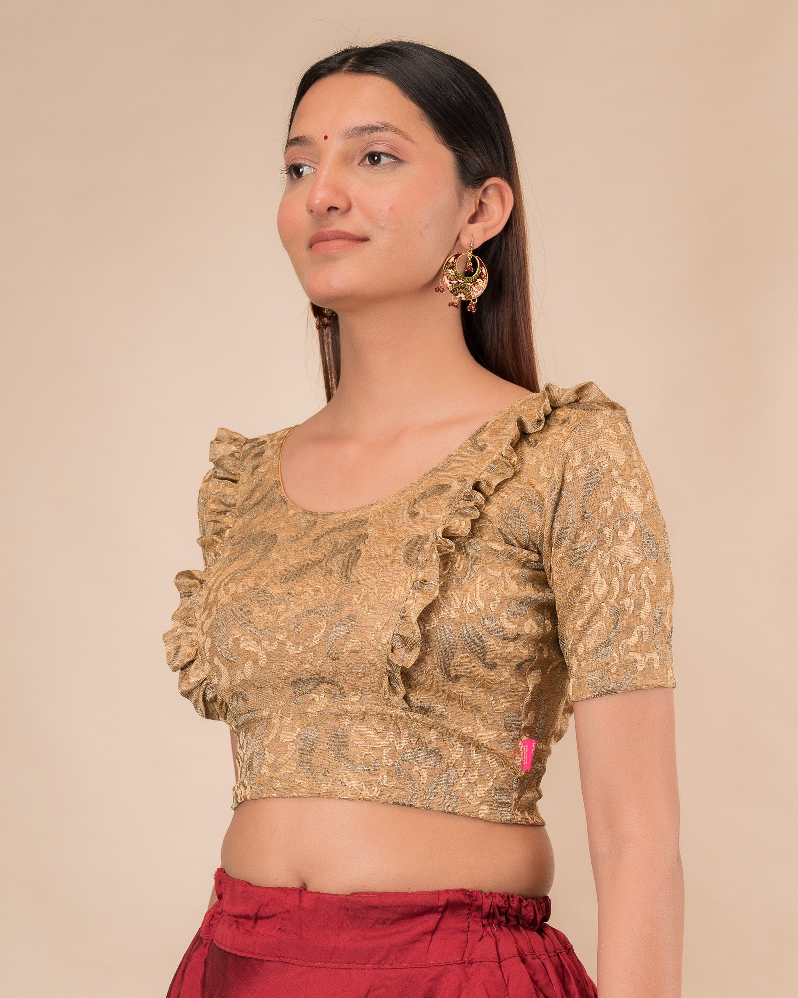Side view highlighting the fit and shoulder ruffles