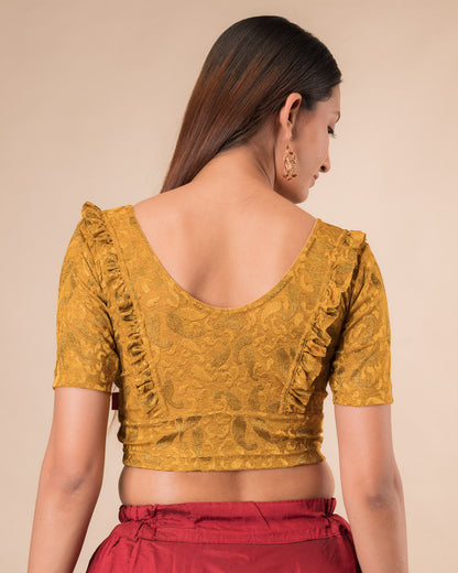 Rear view showcasing the slip-on design and ruffled shoulder detail
