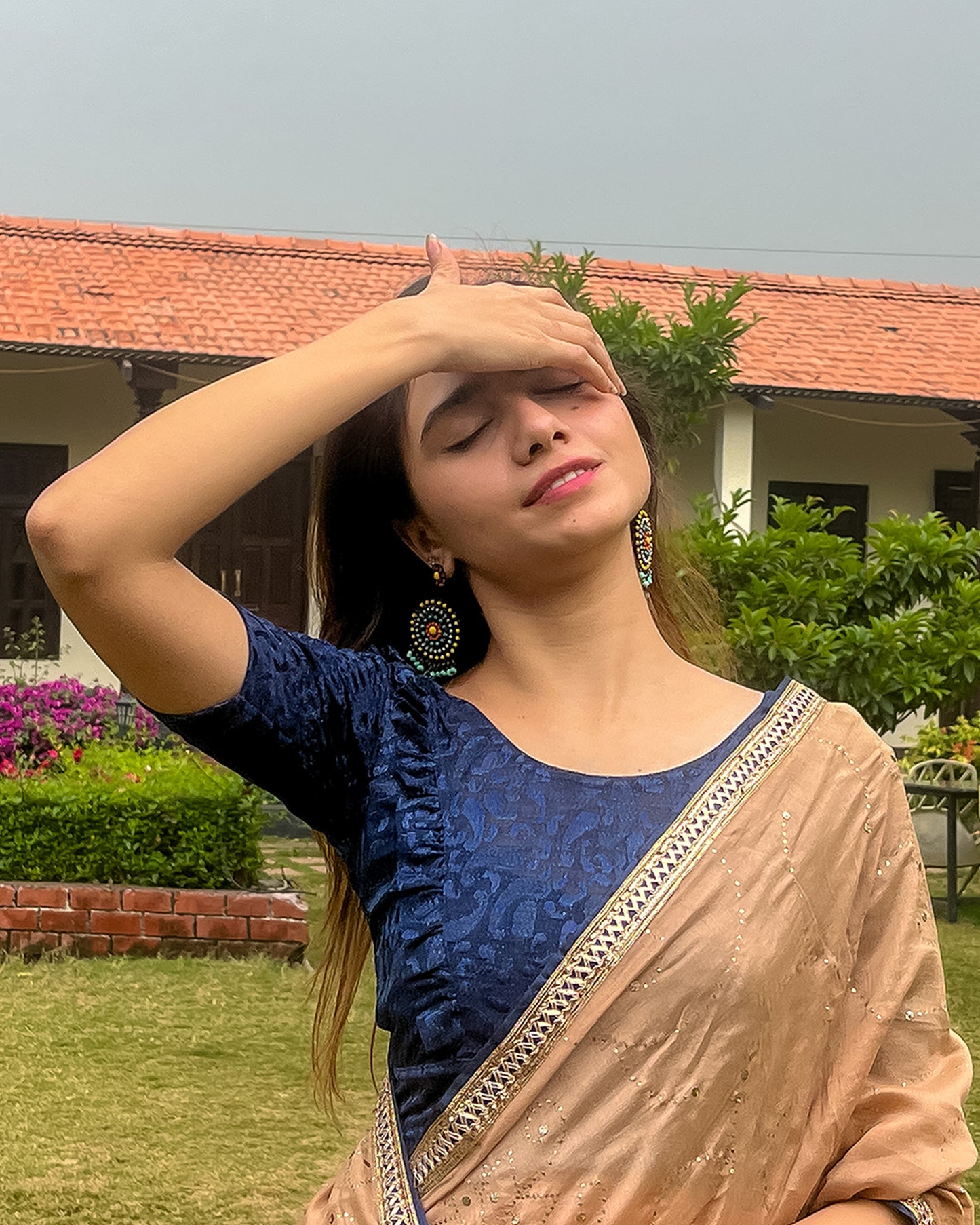 Model pairing the blouse with a saree or skirt for a festive look