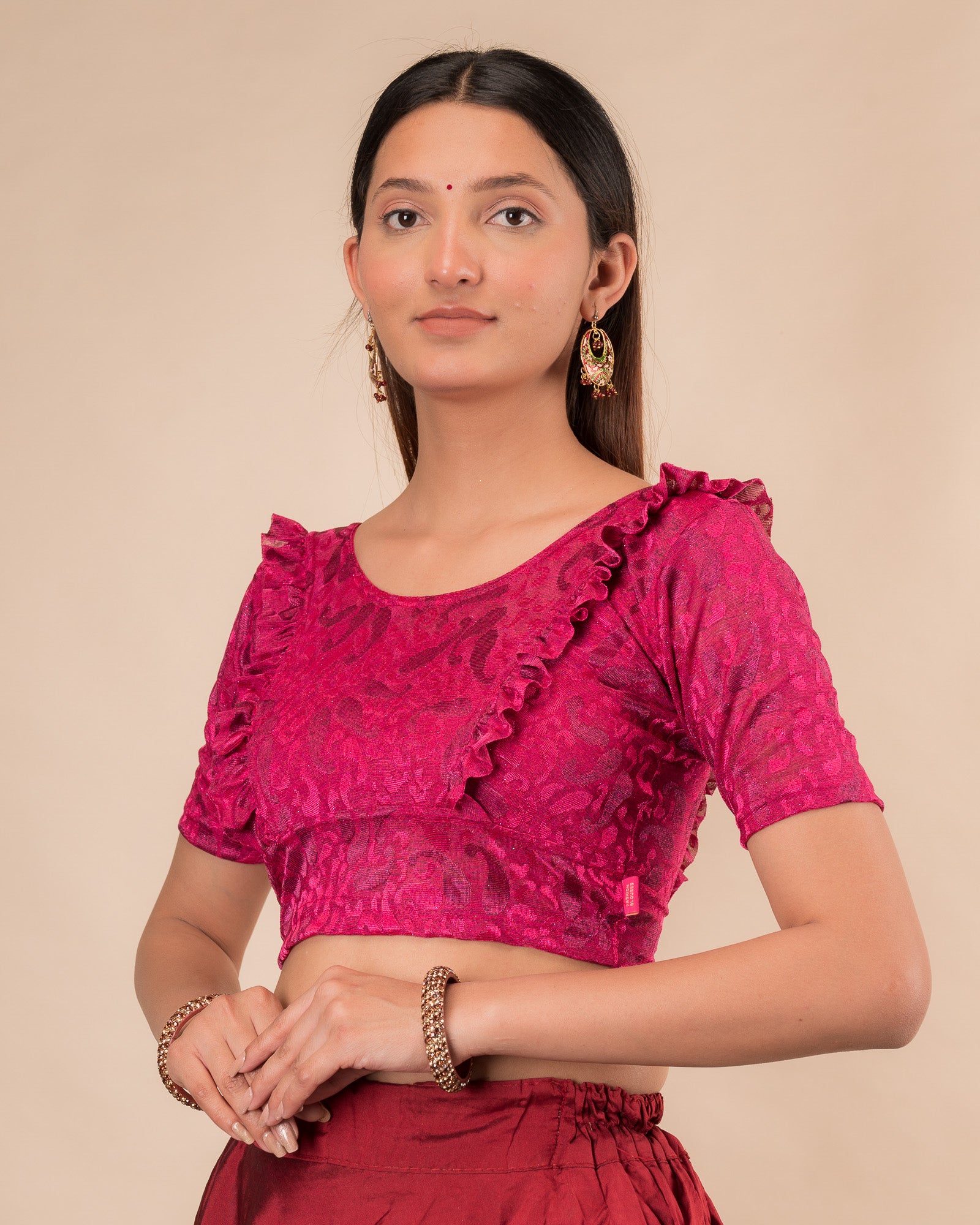 Side view highlighting the fit and shoulder ruffles