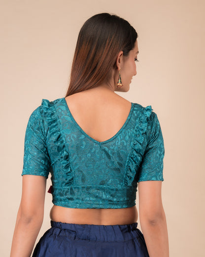 Rear view showcasing the slip-on design and ruffled shoulder detail