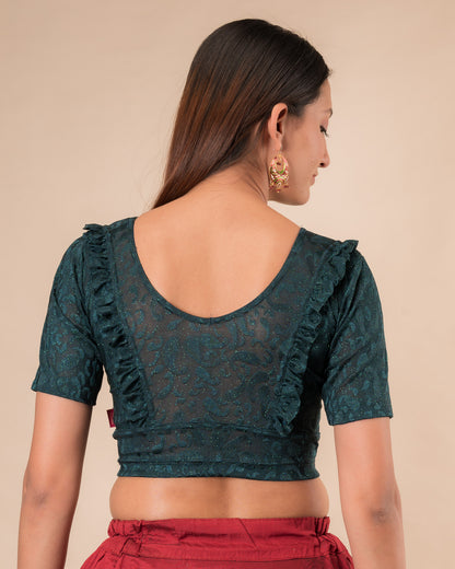 Rear view showcasing the slip-on design and ruffled shoulder detail