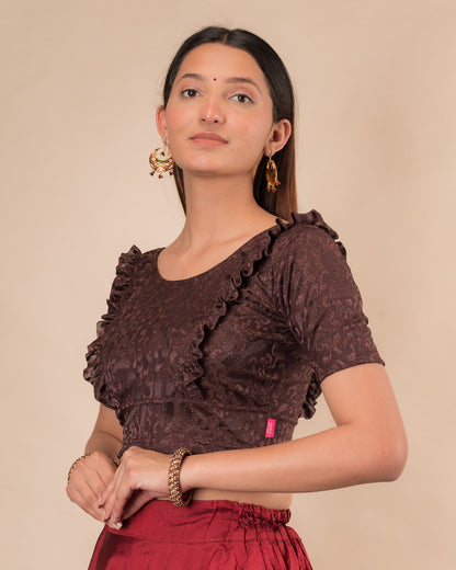 Side view highlighting the fit and shoulder ruffles
