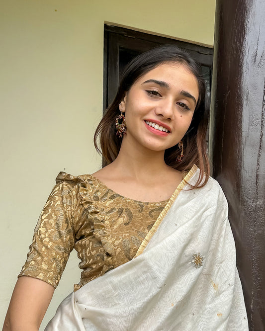 Model pairing the blouse with a saree or skirt for a festive look