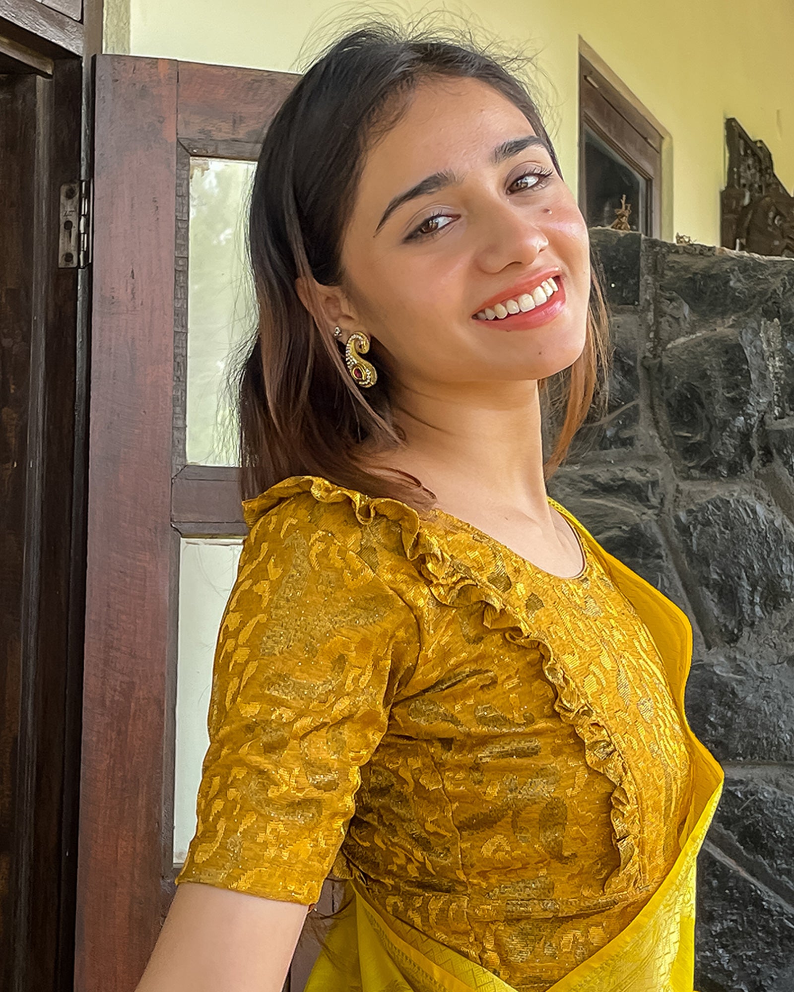 Model pairing the blouse with a saree or skirt for a festive look