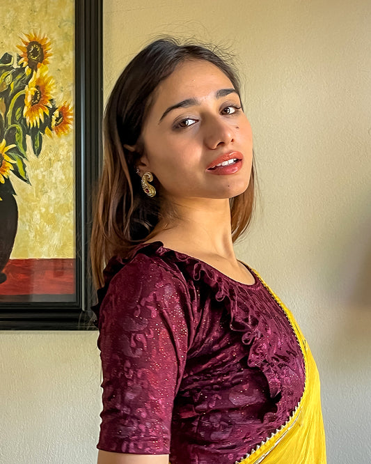 Model pairing the blouse with a saree or skirt for a festive look