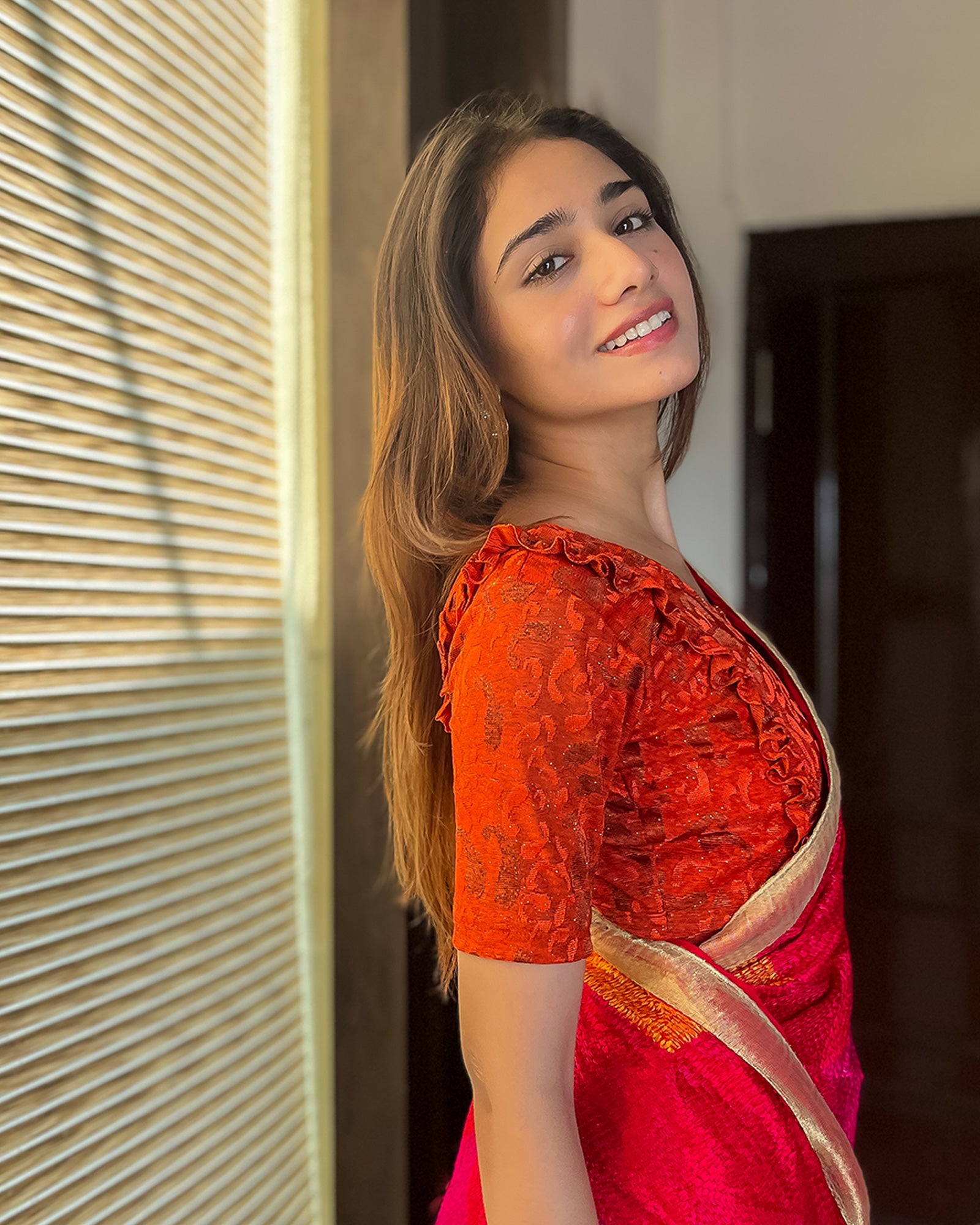 Model pairing the blouse with a saree or skirt for a festive look