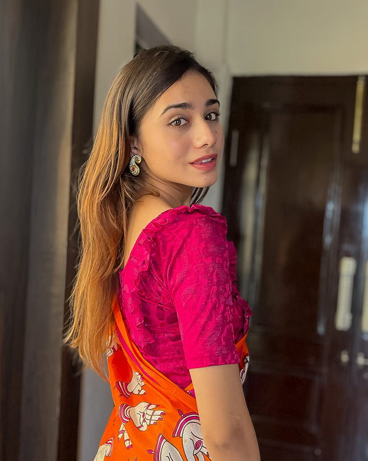 Model pairing the blouse with a saree or skirt for a festive look
