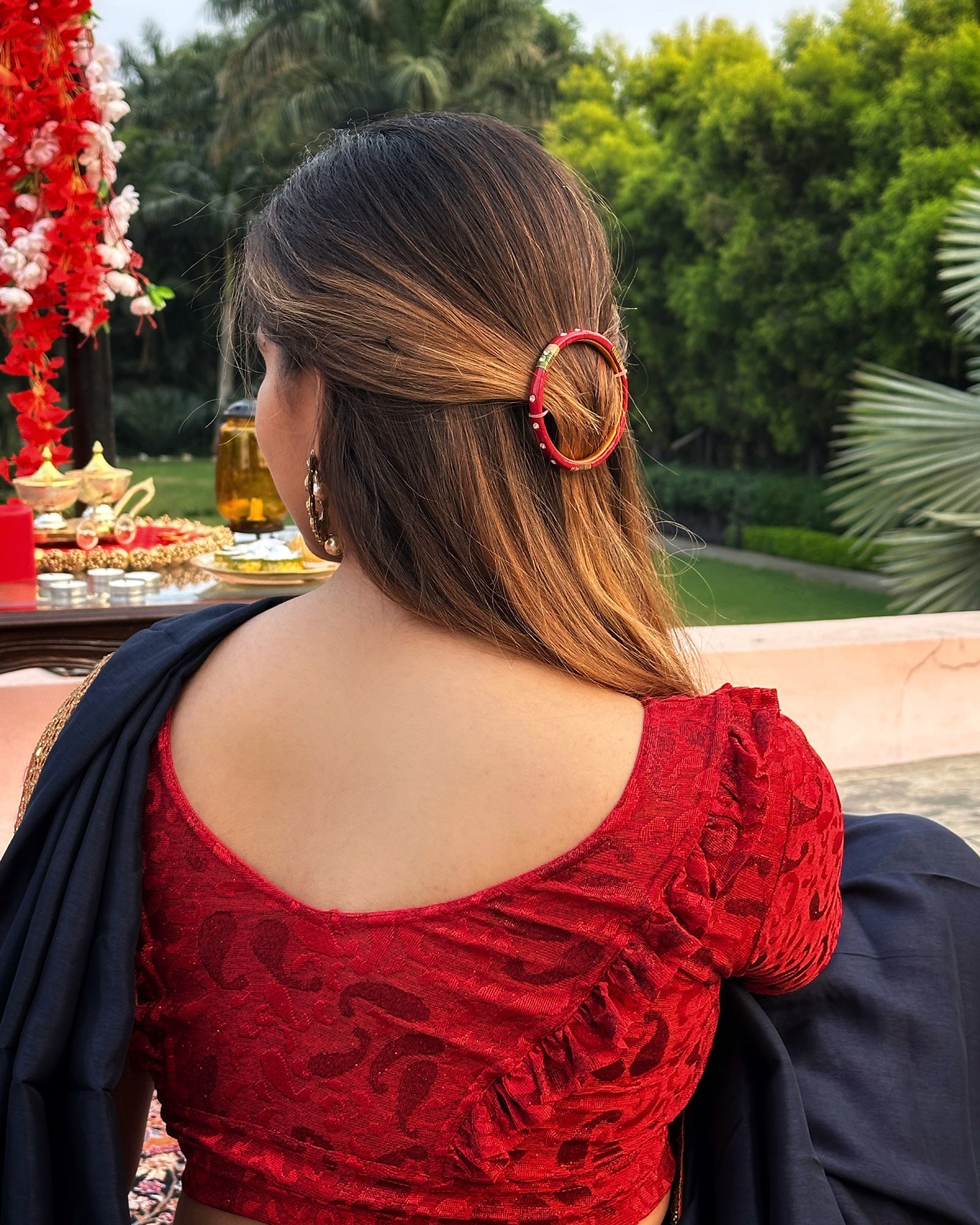 Model pairing the blouse with a saree or skirt for a festive look