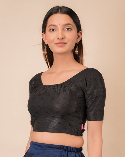 Side profile highlighting the gathered fit and sleeve length