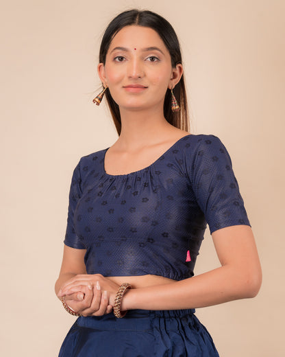 Side profile highlighting the gathered fit and sleeve length