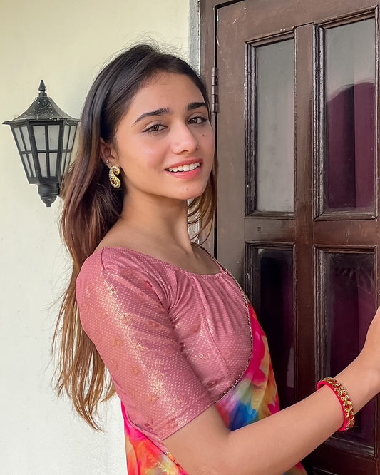 Model pairing the blouse with a saree for an Indo-western look