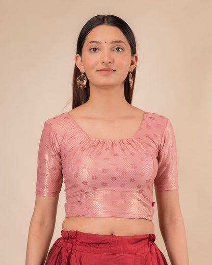 Model wearing a metallic zig-zag striped stretchable choli-style blouse with elbow sleeves and round neckline
