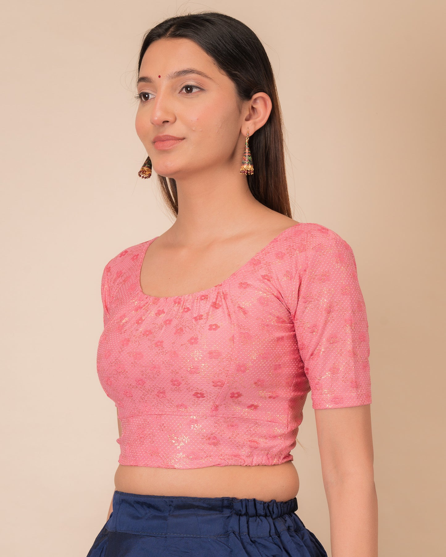 Side profile highlighting the gathered fit and sleeve length