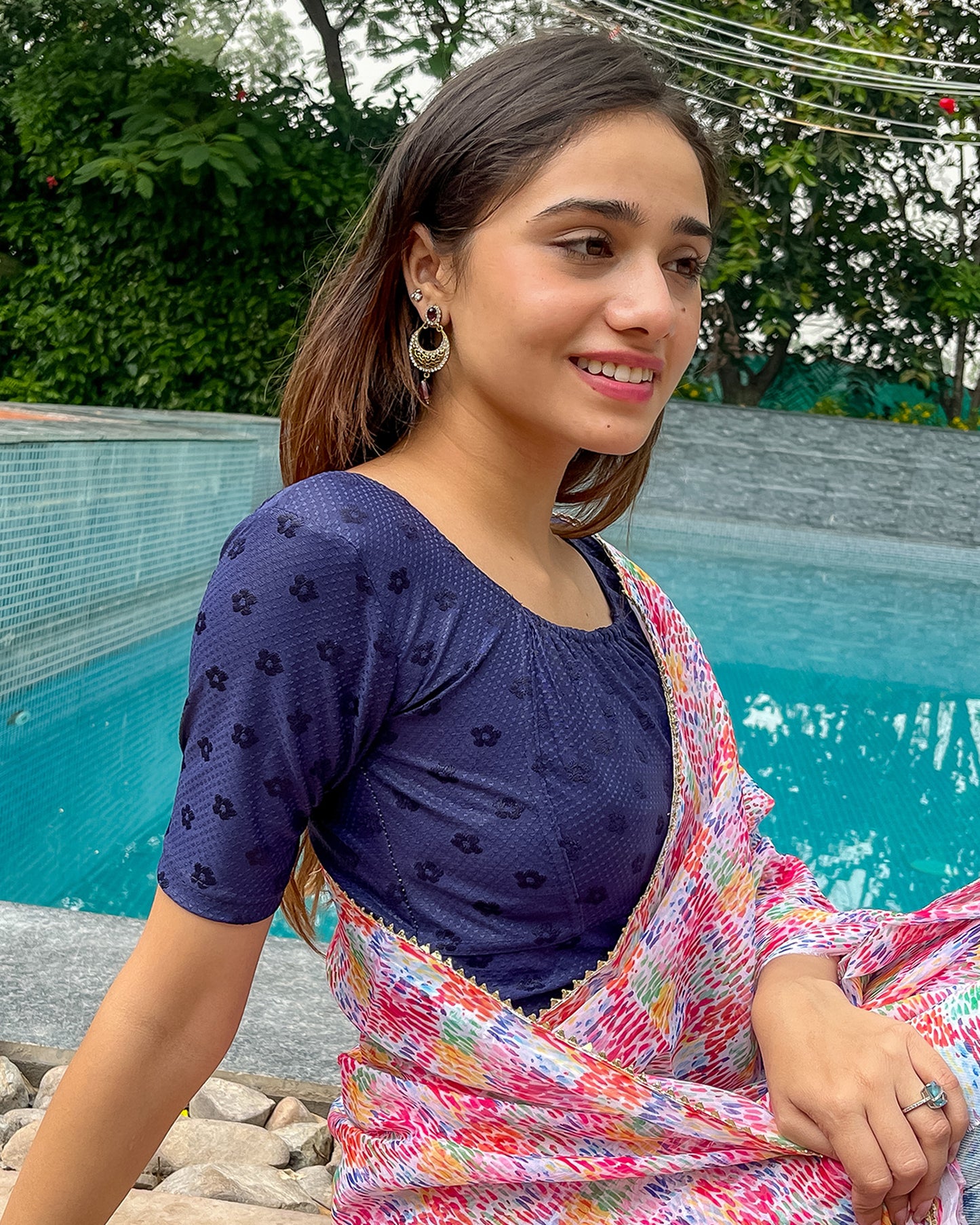 Model pairing the blouse with a saree for an Indo-western look