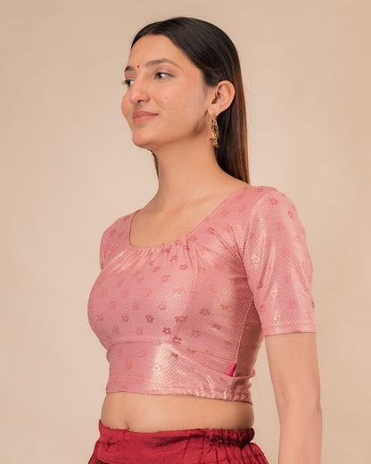Side profile highlighting the gathered fit and sleeve length.