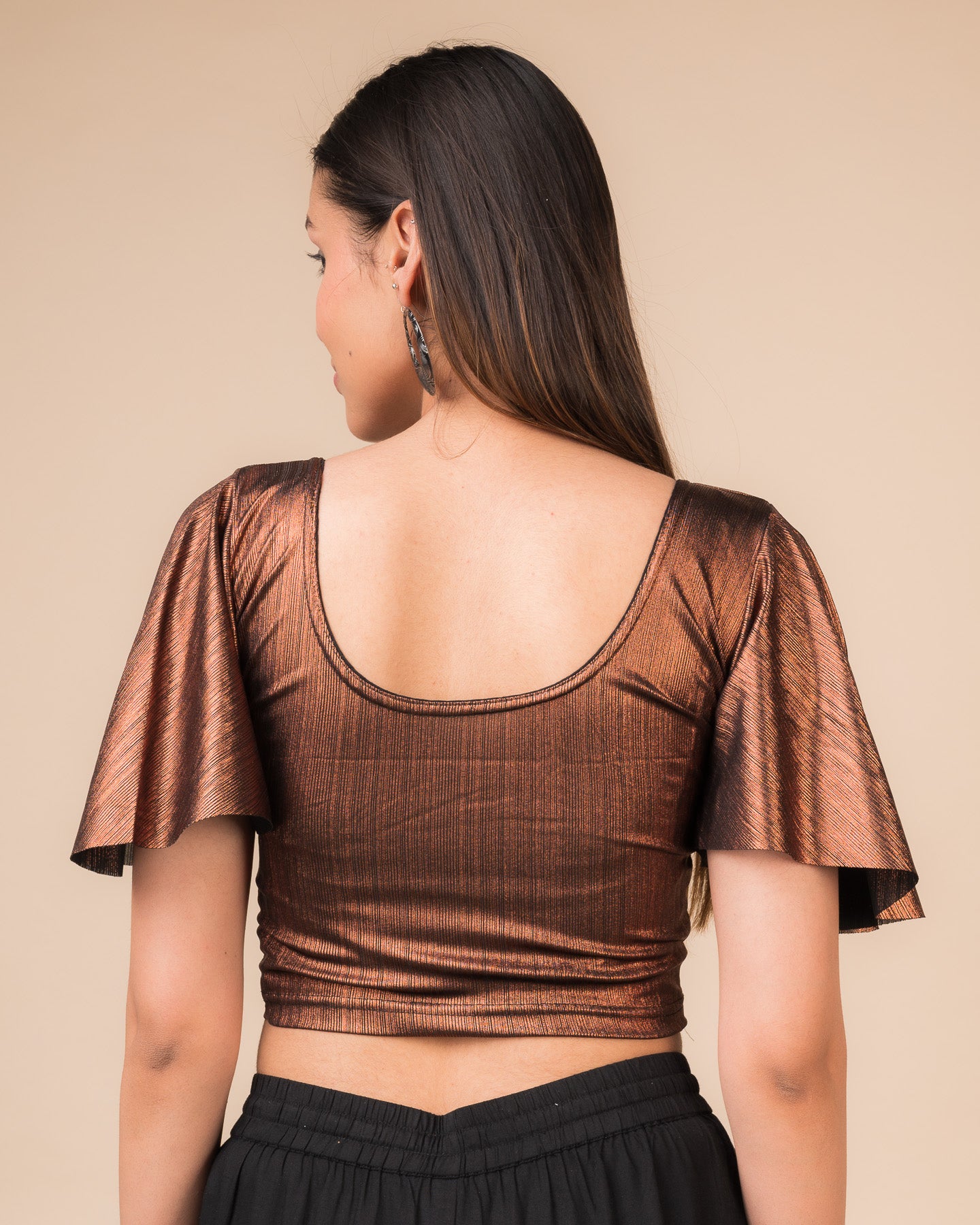 Rear view showcasing the back design and metallic stripes