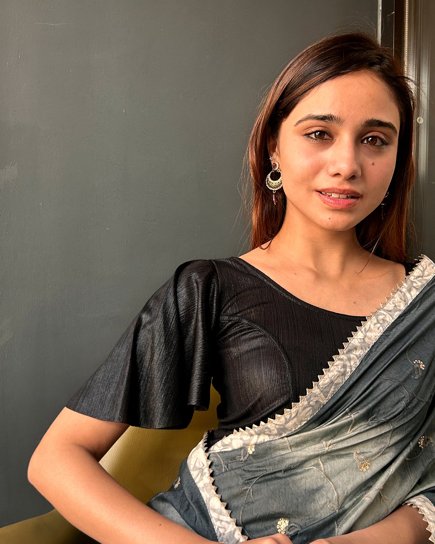 Model pairing the blouse with a saree for a festive event