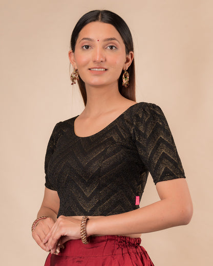 Side view highlighting the fit and shoulder ruffles