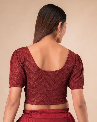 Rear view showcasing the slip-on design and ruffled shoulder detail
