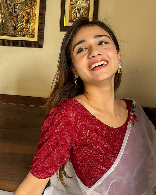 Model pairing the blouse with a saree or skirt for a festive look