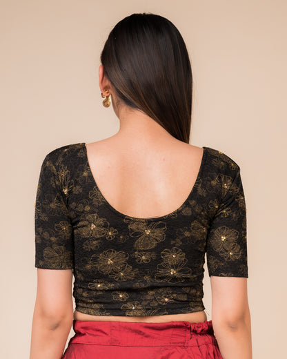 Rear view showcasing the back design texture and embellishments