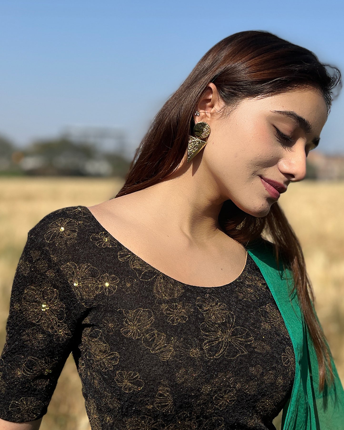 Model pairing the blouse with a festive saree for occasions