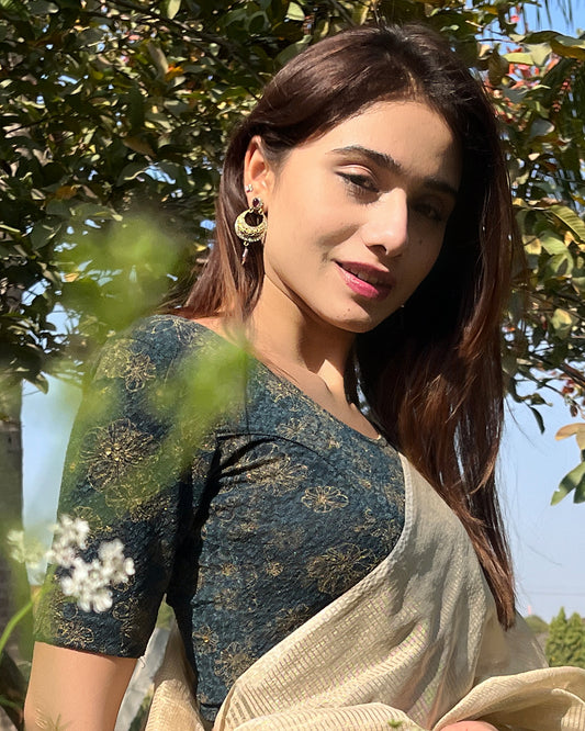 Model pairing the blouse with a festive saree for occasions