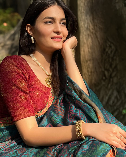 Model pairing the blouse with a festive saree for occasions