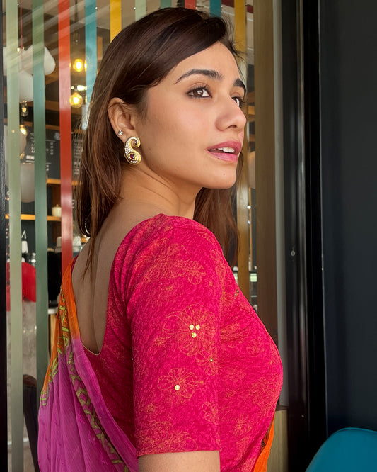 Model pairing the blouse with a festive saree for occasions